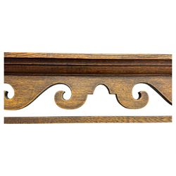 19th century and later oak dresser, moulding cornice a pierced and shaped frieze, over two open plate shelves above a base fitted with two drawers with brass swan neck handles, over panelled twin cupboard with single shelf, cantered corners on bracket feet