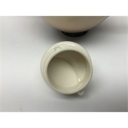 Franz Teapot decorated with dragonflies, together with a matching sucrier and cover and a cup and saucer in Iris pattern, all with printed mark beneath 