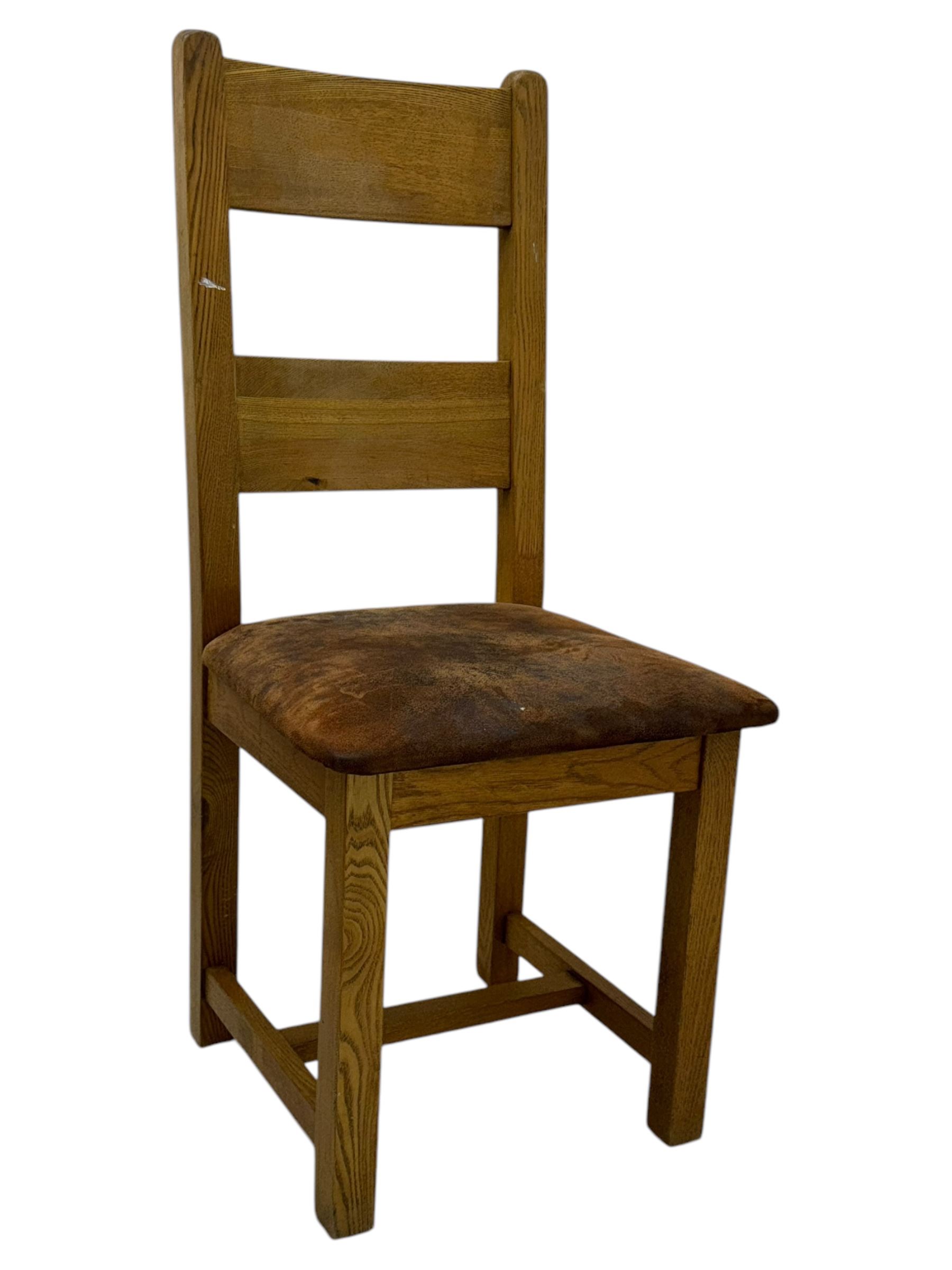 Solid oak extendable dining table and set of four matching chairs, two leaf inserts, with breadboard ends on tapered square supports (Extended length 205cm)