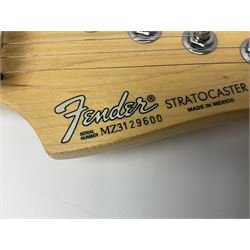 Mexican Fender Stratocaster electric guitar in black c2003 with Floyd Rose tremolo system, serial no.MZ3129600; L98cm; in Freestyle fitted case with 2006 Diamond Anniversary booklet