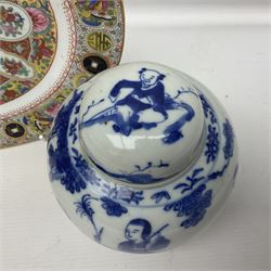 Canton plate and a ginger jar decorated with figures in a garden 