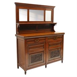Late Victorian mahogany mirrored back sideboard, the mirror back with three bevelled mirror plates above a single shelf, rectangular moulded top over two frieze drawers with brass handles, above a twin panelled cupboard, carved recessed panels decorated with flowers and foliage, fluted uprights, raised on turned feet