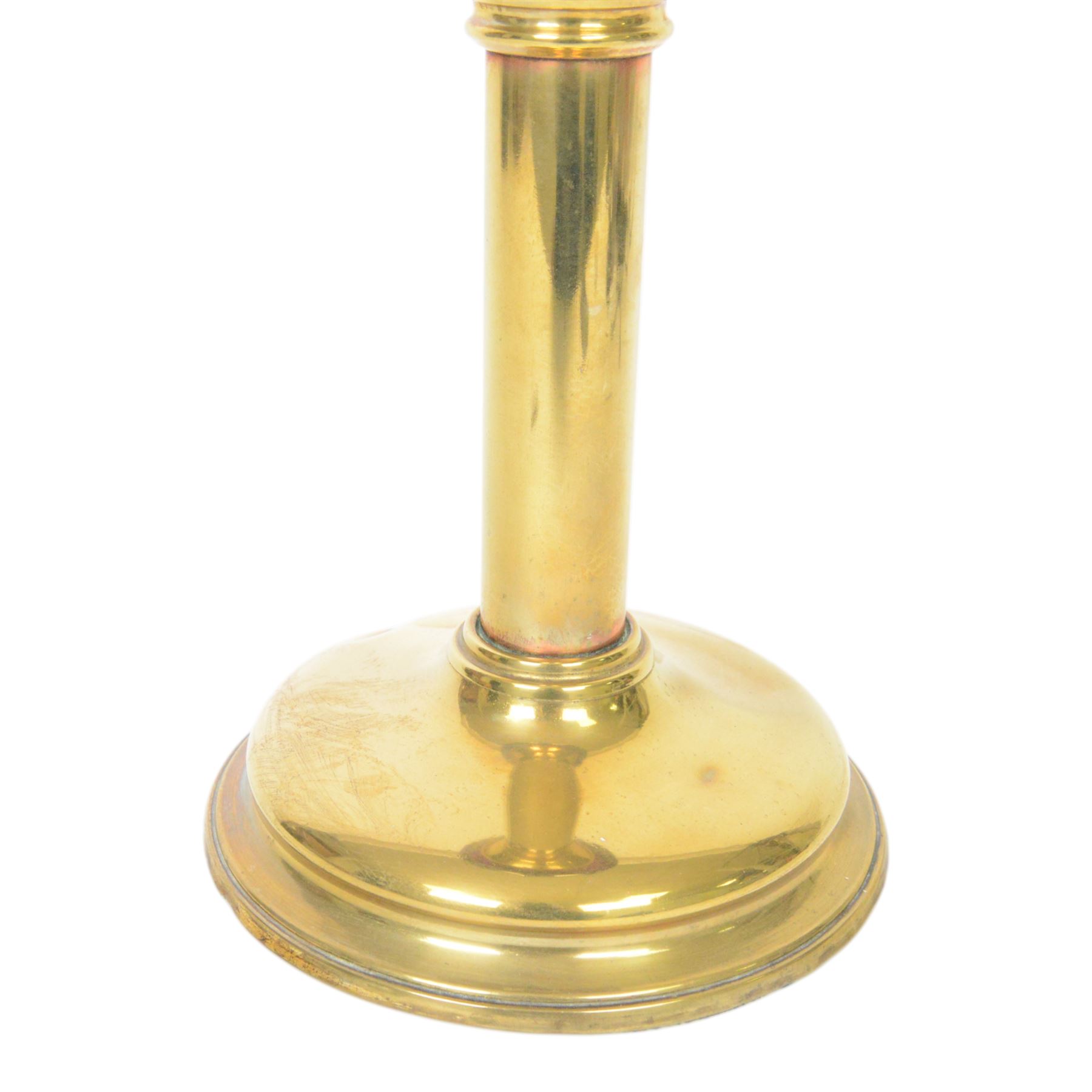 Victorian oil lamp, the brass base supporting a floral enamelled amethyst glass reservoir, duplex burner, and clear glass chimney, overall H69cm