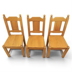 Contemporary solid oak dining table, and set of eight chairs, rectangular plank top with chamfered edges, raised on square supports