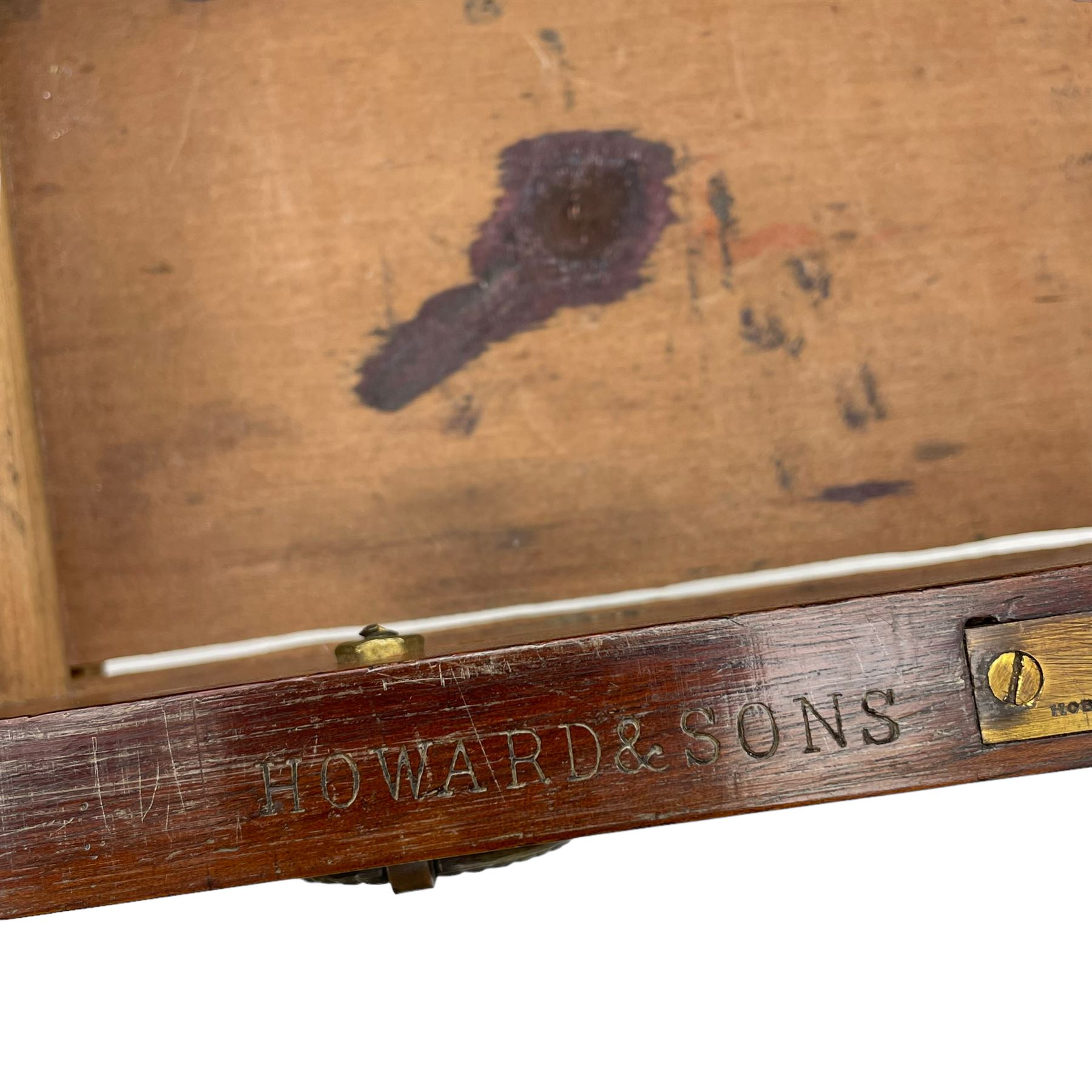 Howard & Sons. - 19th century walnut twin pedestal desk, moulded rectangular top with tooled leather inset, fitted with nine drawers with circular pressed brass handle plates decorated with urns, each drawer fitted with a 'Hobbs, London' lock, on plinth base, the upper right-hand drawer stamped 'Howard & Sons, Berners St.' and with paper label