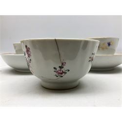 Two 18th century Newhall tea bowls and saucers, the first example decorated with pattern no 195, hand painted painted with floral sprays, the second hand painted with flowers in a gilt boarder, together with a similar tea bowl