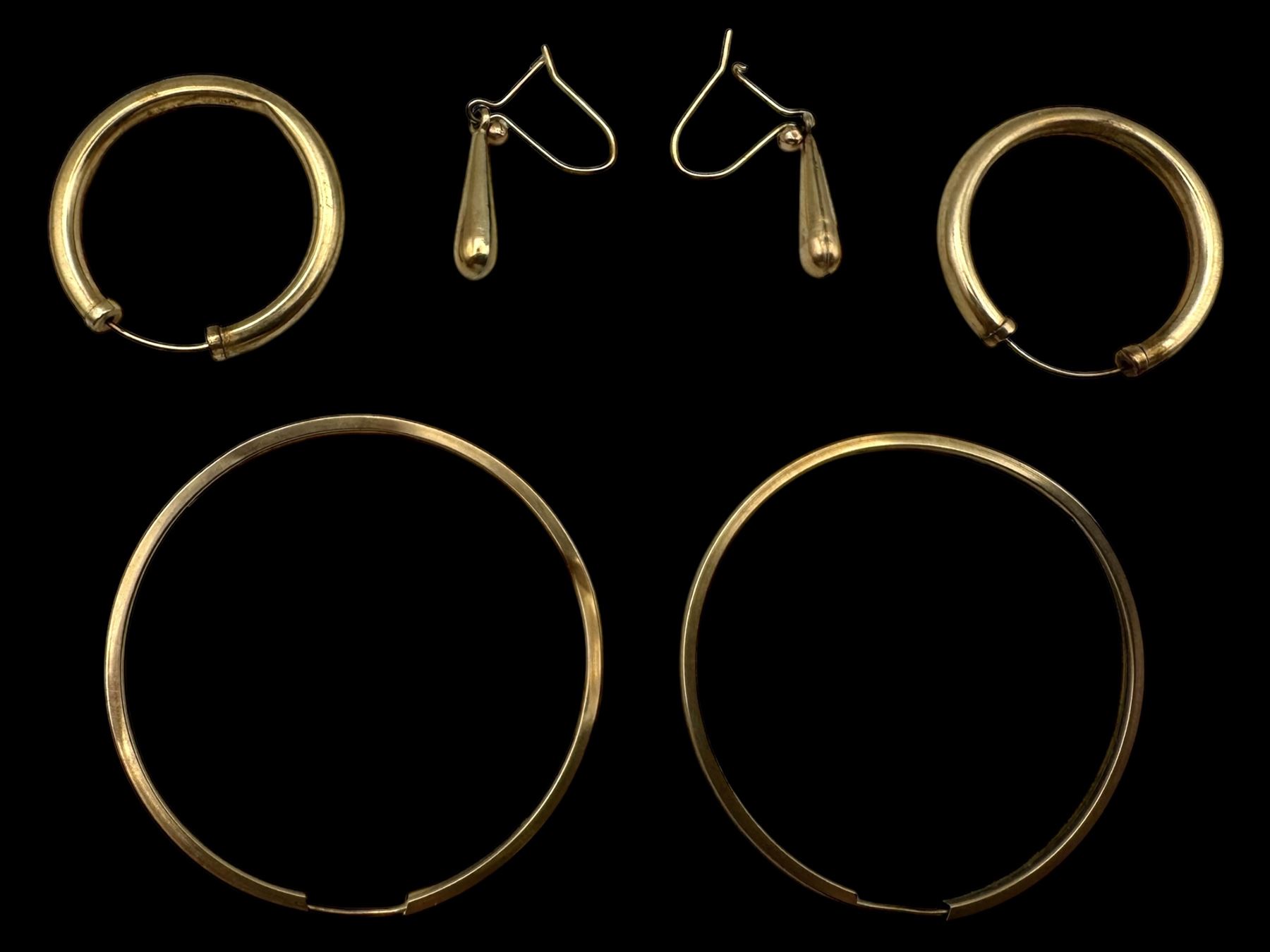 Three pairs of 9ct gold earrings, including two pairs of hoop earrings