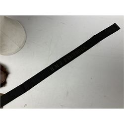 WW1 British Army Derby Scheme 1915 Attested armband; beret with East Yorkshire cap badge; pair of fur lined leather flying/motorcycle goggles; HMS Pembroke cap band; and small quantity of RNAS cloth and metal badges etc