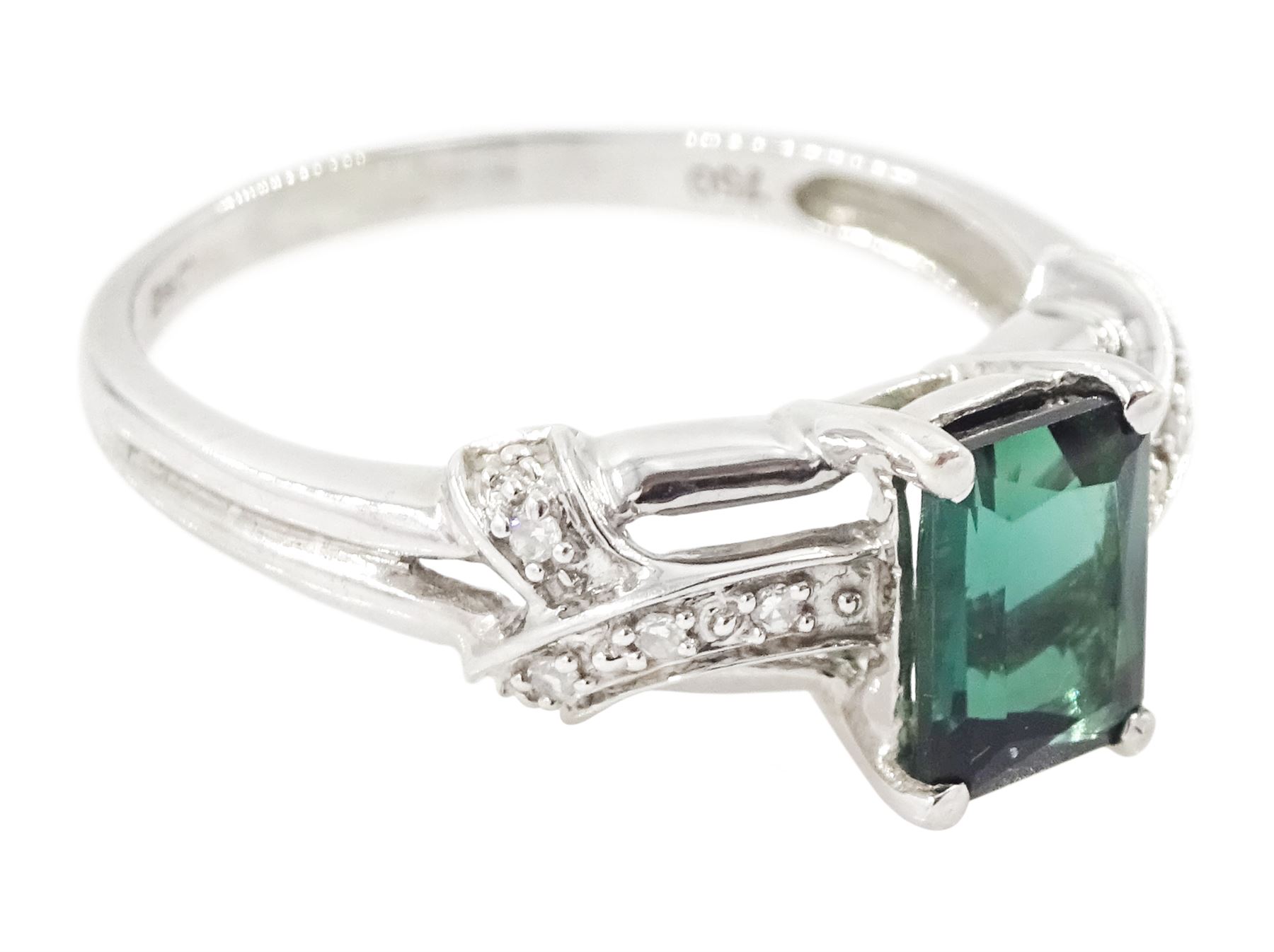 18ct white gold green tourmaline and diamond ring, single radiant cut tourmaline of approx 1.00 carat, with crossover pierced design shoulders set with single cut diamonds, hallmarked