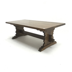 Large refectory style rectangular oak coffee table, shaped solid end supports joined by single stretcher, W151cm, H51cm, D71cm