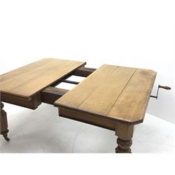 *Edwardian oak telescopic extending dining table, canted rectangular top with moulded edge, on turned supports with mounts and brass cups and castors, no additional leaves, 120cm x 135cm, H75cm