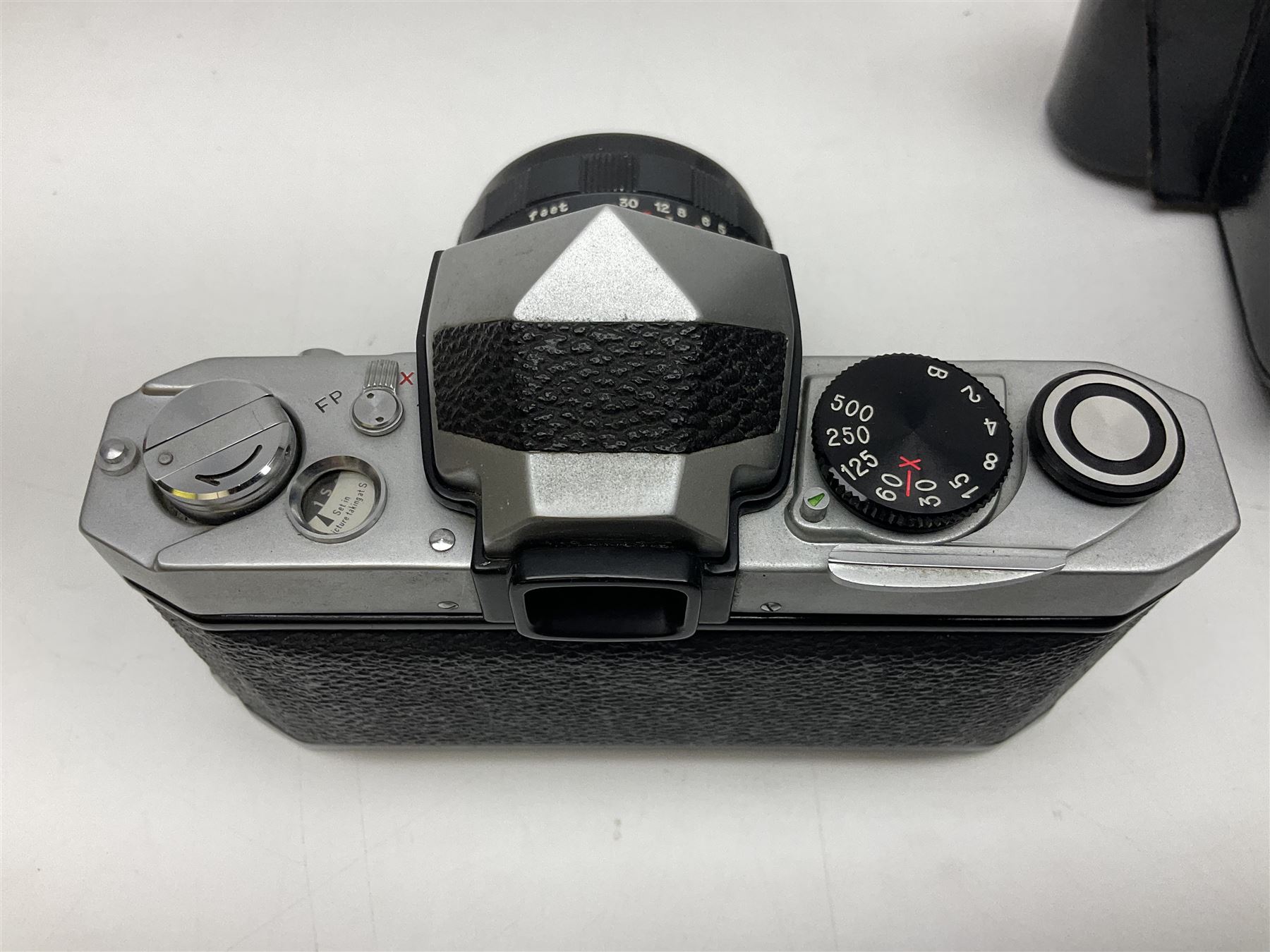 Petri Flex 7 camera body, serial no. 555698, with Perti C.C 1:1.8 f=55mm' lens, serial no. 78253, together with Petri Flex V2 camera body, serial no. 364427, with 'Petti C.C. 1:2 f=55mm' lens, serial no. 137076, in ever ready case