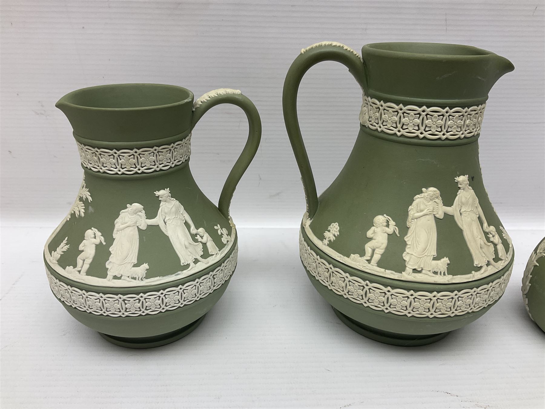 Collection of  Wedgwood green Jasperware, to include large jug, vases, trinket dishes, etc together with two teal Jasperware vases 