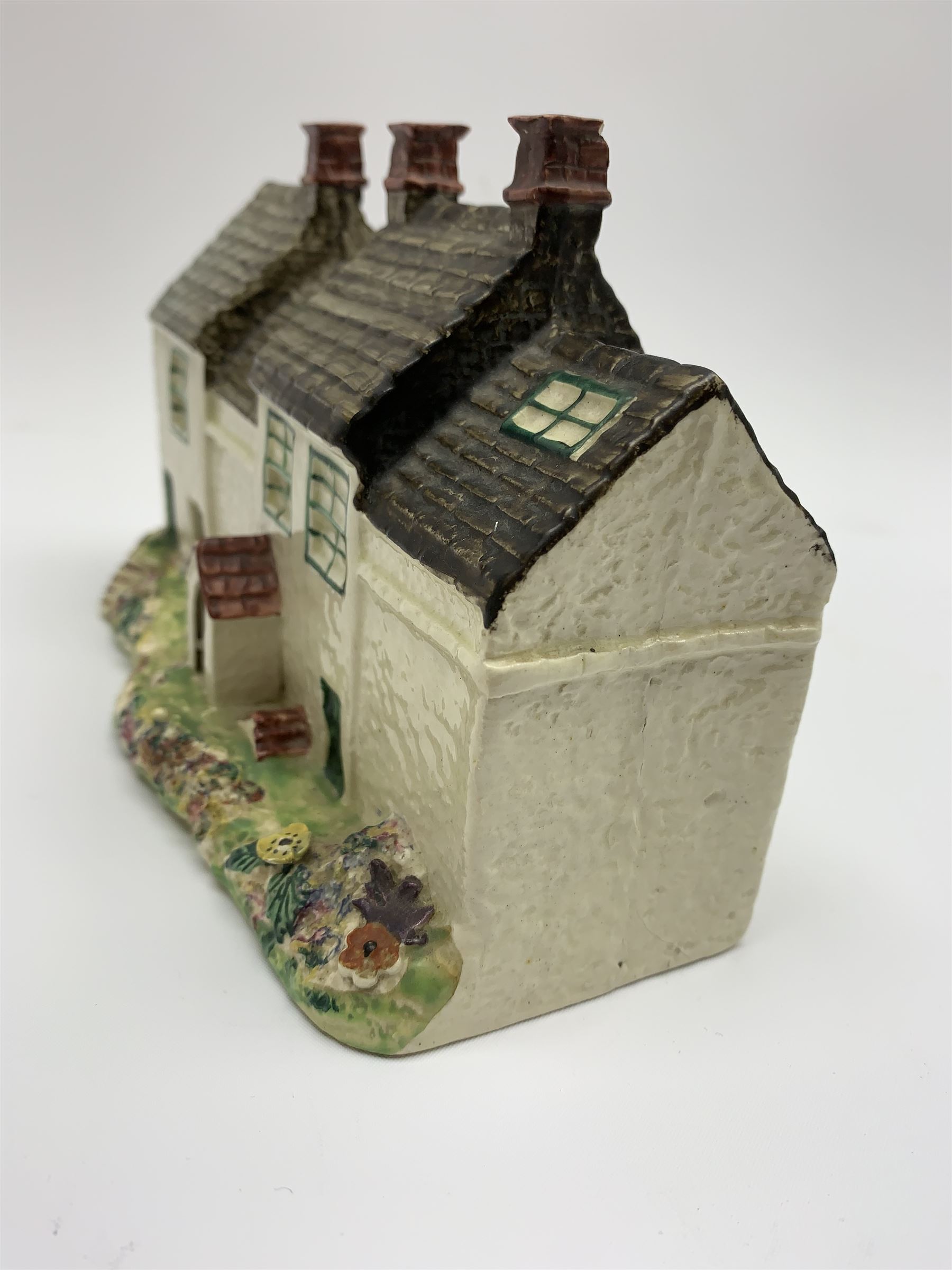 Leeds Pottery pastille burner modelled as two terrace cottages, with impressed mark beneath, H12cm L19cm