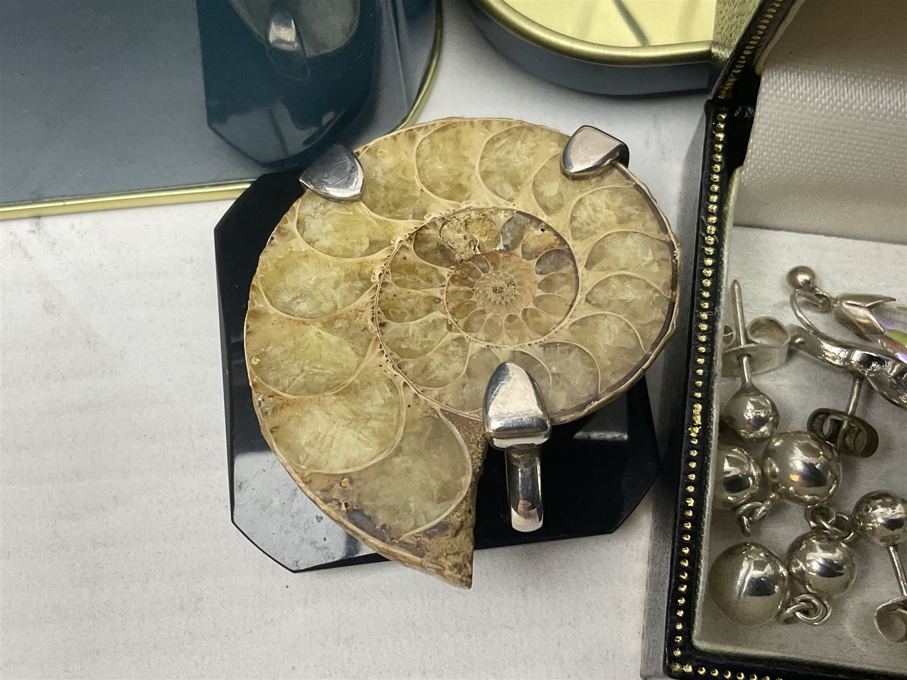 Silver ammonite pendant, silver earrings and a collection of beaded and other costume jewellery