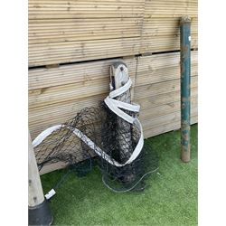 Pair of Edwardian cast iron and wood tennis posts, with net - THIS LOT IS TO BE COLLECTED BY APPOINTMENT FROM DUGGLEBY STORAGE, GREAT HILL, EASTFIELD, SCARBOROUGH, YO11 3TX