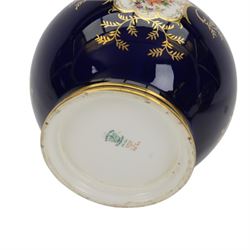 Pair of early 20th century Coalport vases, each of squat bulbous form, decorated with hand painted reserves of landscapes against a blue ground heightened with gilt, with printed marks beneath and numbered V5146 in gilt, H13cm, and a similar smaller example painted with a reserve of an exotic bird, numbered 5146, H11cm