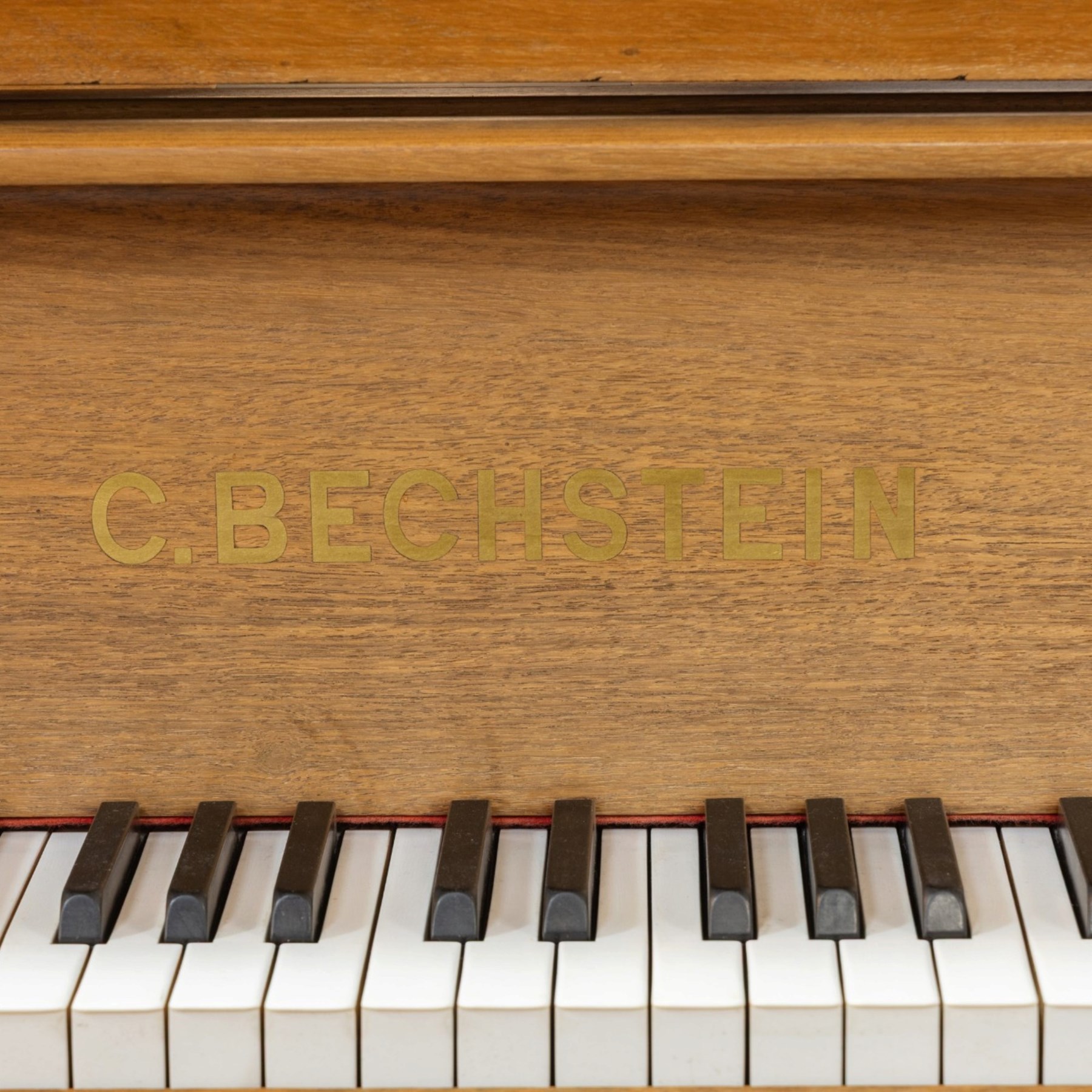 Edwardian C. Bechstein mahogany cased baby grand piano, serial no. 84403 circa 1907, retailed by 1066 Pianos Cambridge, raised on turned and faceted tapering supports terminating in brass castors, H100cm, L183cm
This item has been registered for sale under Section 10 of the APHA Ivory Act