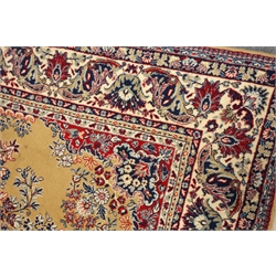  Persian style dark beige ground rug, central medallion (240cm x 170cm), a runner rug and two other rugs (4)  