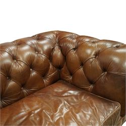Timothy Oulton for Halo – tan leather three-seater Chesterfield sofa, fully deep-buttoned to the arms, back and seat, with studded front rail, rolled armrests and turned bun supports