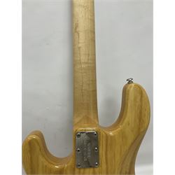 Ernie Ball Music Man Sting Ray 4 string bass guitar, in natural finish with roasted maple neck and tortoiseshell effect scratch guard, serial no 87485, in black Music Man hard case, guitar L114cm