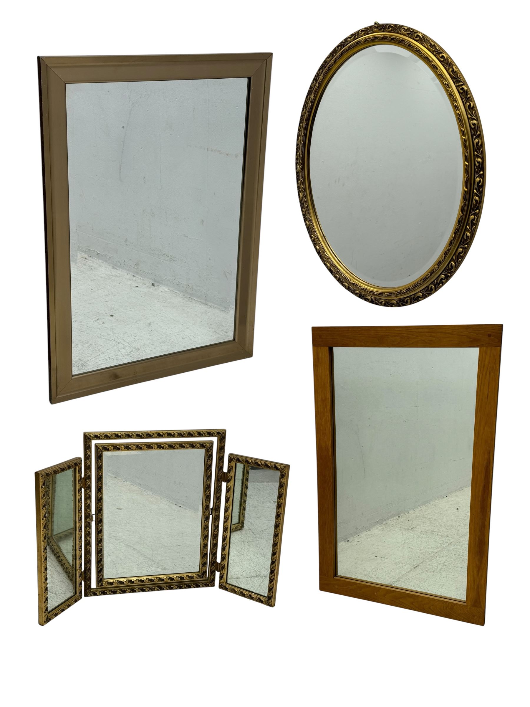 Four decorative mirrors, including gold-toned triptych dressing mirror with foliate borders, two rectangular framed mirrors and a circular gilt mirror with ornate edging