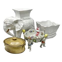 White glazed elephant jardiniere stand; Capo di Mote table centre-piece; and French game-pie dish