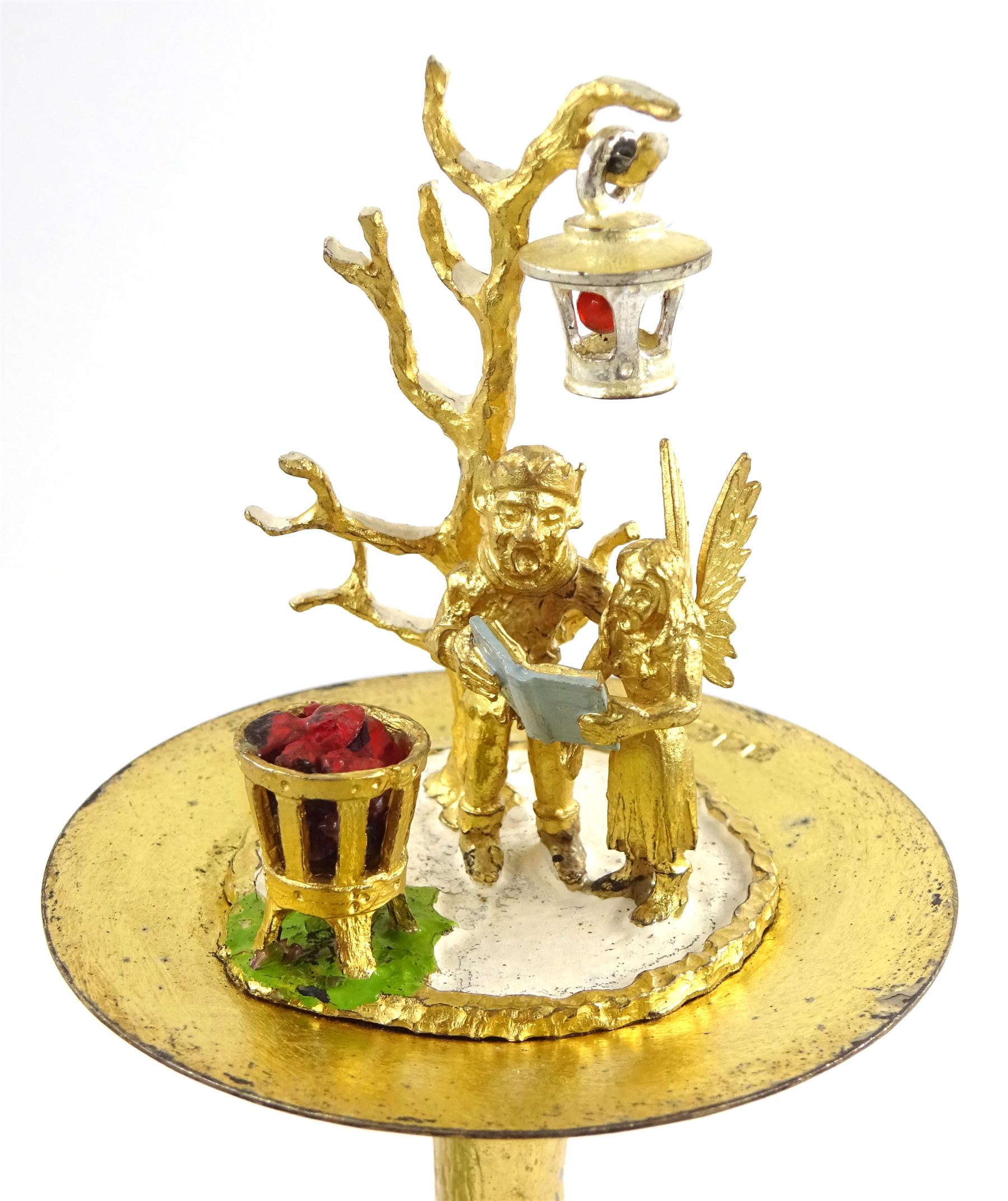 Christopher Nigel Lawrence limited edition silver and parcel gilt surprise mushroom, the textured domed cover opening to reveal two elves carolling beneath a lantern and before a fire pit set with semi-precious stones, upon a slate base, no 24/250, hallmarked Christopher Nigel Lawrence, London 1982, overall H9cm