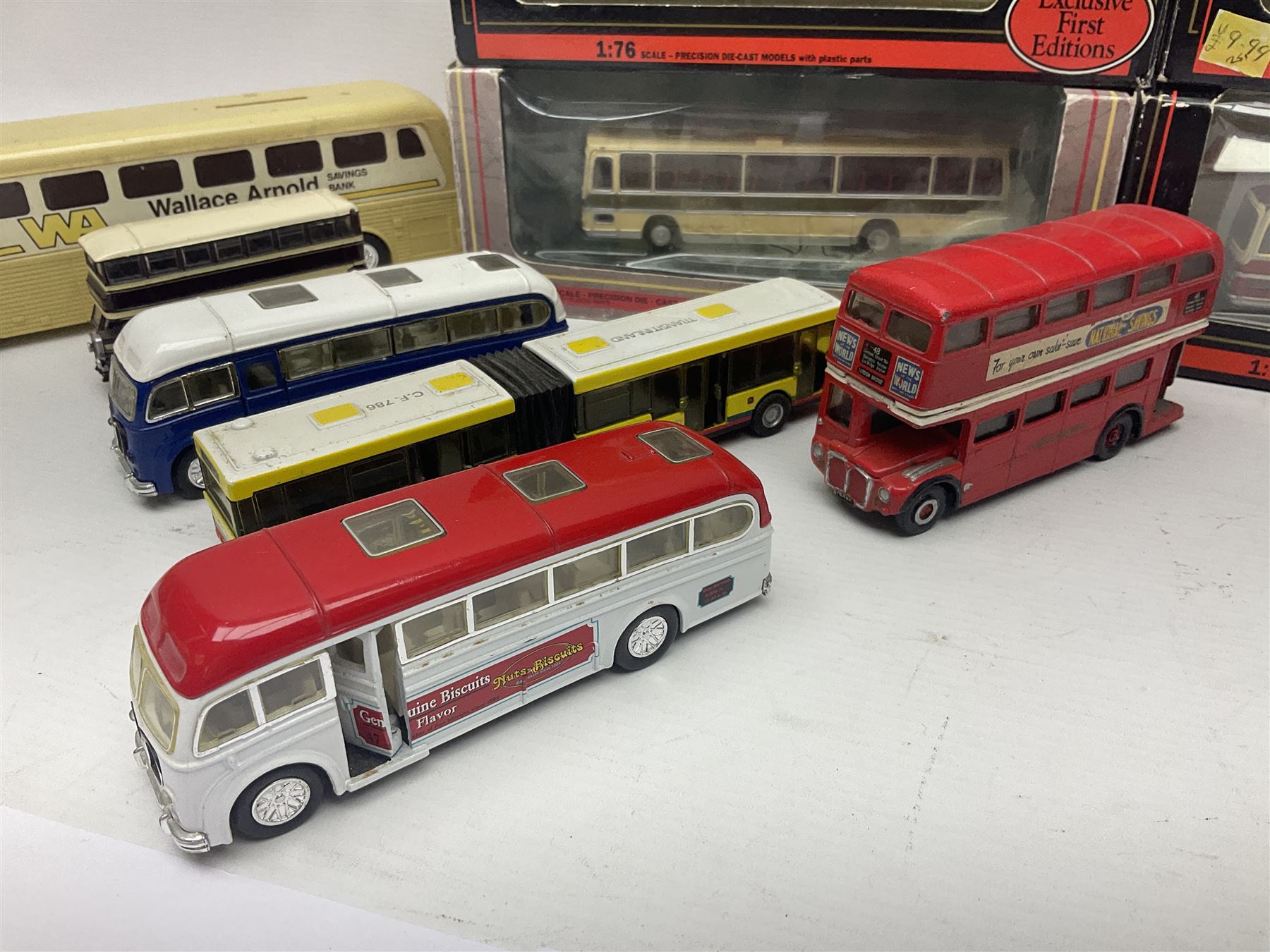Thirty-one modern die-cast models of buses, coaches and wagons of various scales by EFE, Lledo, Oxford Die-Cast, Atlas etc, to include EFE 15702, 15704 and 15708 boxed; further models are unboxed 