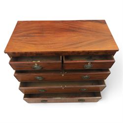 19th century mahogany chest, two short over three long drawers with brass handles, raised on shaped feet