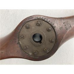 Early 20th century Avro 504 80HP Gnome laminated mahogany two-blade propeller with metal centre to the hub, stamped to the face of the hub 'AVRO Y80 80HP GNOME TYPE 504 & 504A A.I.D.29 A.I.D.32 1545' and to the sides of the hub '2744 DIA 1829 PITCH' and '1470'; traces of A.V. Roe & Co Ltd Manchester transfers to both blades L273.8cm; Auctioneer's Note: The Avro 504 was introduced in 1913 and was quickly taken up by the Royal Flying Corps as a trainer and observation machine; robust and versatile it remained in general service as a trainer until the late 1920s then widely for civilian use as a joy-rider and for stunt displays. The legendary RAF WWII ace, Douglas Bader, took instructions and would have had his first solo flight in just such a machine.
