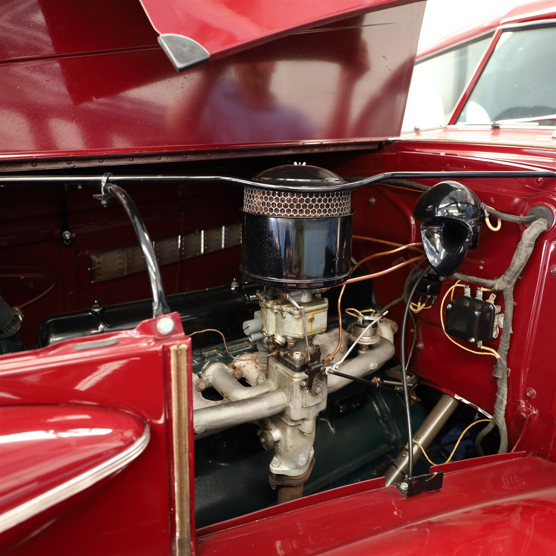 1937 Buick Special Sport Coupe

Registration: LXS 932
Serial number: 744273817
Engine: 4,064cc straight-eight petrol
Odometer reading: 6,476 miles
Steering: Left-hand drive
Colour: Deep maroon
V5C: Present
Keys: One

From the Estate of the late John Sils.

A striking 1937 Buick Special Sport Coupe, finished in deep maroon and manufactured at the General Motors plant in Oshawa, Ontario, Canada.

The Buick Special formed part of the marque’s Series 40 range and combined dramatic period styling with Buick’s smooth 248cu in, approximately 4,064cc, straight-eight engine. The Sport Coupe was among several body styles offered for 1937 and is distinguished by its sweeping wings, prominent vertical grille, split windscreen and enclosed rear luggage compartment.

This example was imported into the United Kingdom and first registered here in November 2019, receiving the registration LXS 932. The odometer displays 6,476 miles, although this mileage has not been independently verified.

The car is very well presented throughout, with excellent deep-maroon paintwork, extensive brightwork and a highly detailed period Art Deco interior featuring its dashboard, centrally mounted ventilation grille, original-style instrumentation and controls. The luggage compartment is neatly trimmed and incorporates a securely mounted spare wheel beneath a raised floor.

The underside also presents particularly well, appearing clean and extensively finished in black, with the chassis, suspension, axles and associated components showing evidence of careful restoration and ongoing maintenance.

Overall, this is an impressive and imposing pre-war Buick, presented in very good condition throughout.

Features

• Canadian-built Buick Special Sport Coupe
• Manufactured at General Motors, Oshawa, Ontario
• 4,064cc straight-eight engine
• Left-hand drive
• Deep-maroon exterior finish
• Extensive chrome brightwork
• Split windscreen
• Period Art Deco interior
• Original-style dashboard and instrumentation
• Dashboard-mounted clock
• Front bench seating
• Enclosed rear luggage compartment
• Underfloor spare wheel
• UK registered since November 2019
• V5C present
• One key

Condition

Presented in very good condition throughout, with excellent paintwork and a clean, highly detailed underside.

This vehicle forms part of the Estate of the late John Sills and is offered for sale by the Executors, providing a genuine reason for sale.