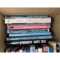 Large collection of hardback and paperback books, mainly military books, to include Band of Brothers, Dawn of D-Day, Dessert Warrior, Book of the Somme, Battle of Britain, etc in four boxes  