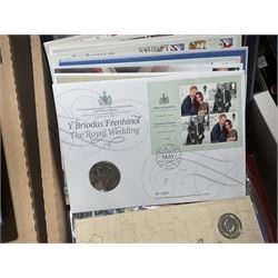 Approximately one hundred and fifteen Royal Mint coin covers, in two ring binder folders and loose, together with approximately 53 grams of Great British pre-1920 and approximately 68 grams of Great British pre-1947 silver threepence coins, and a small quantity of further pre-decimal coins