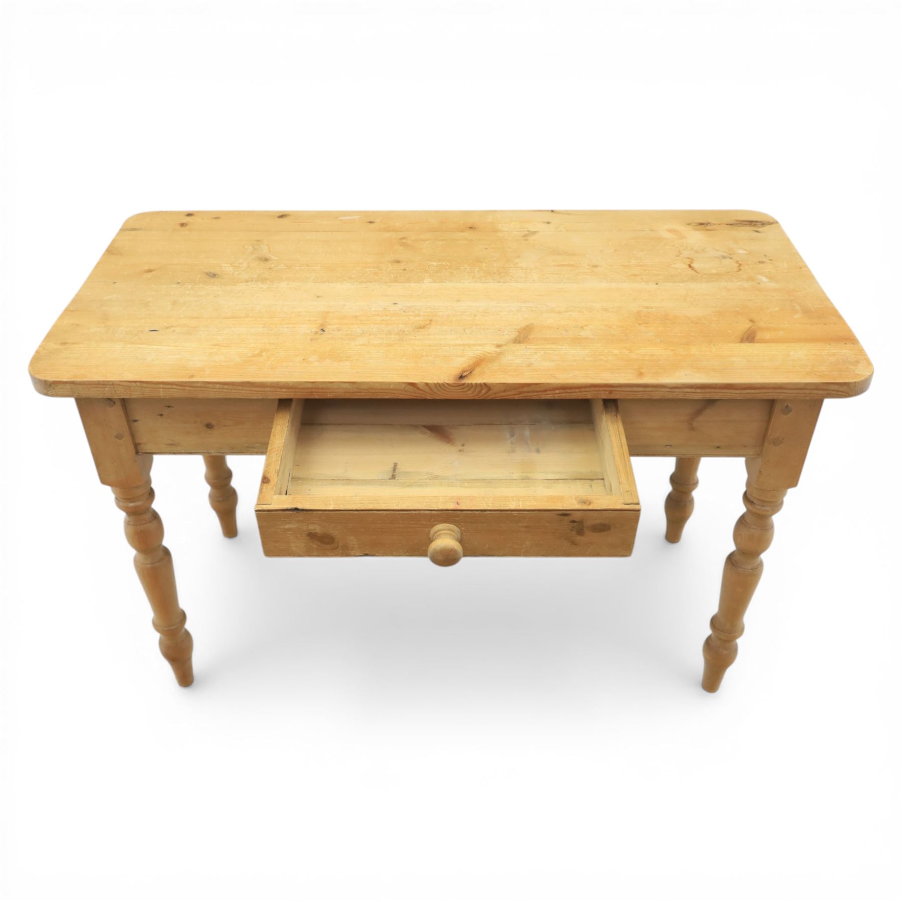 Victorian design stripped pine table, rectangular top with rounded corners, single centre drawer, raised on four turned legs
