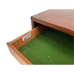 NH Chapman & Co Siesta - mid-20th century sideboard, fitted with three sliding doors, enclosing two drawers and shelves, raised on twin end supports