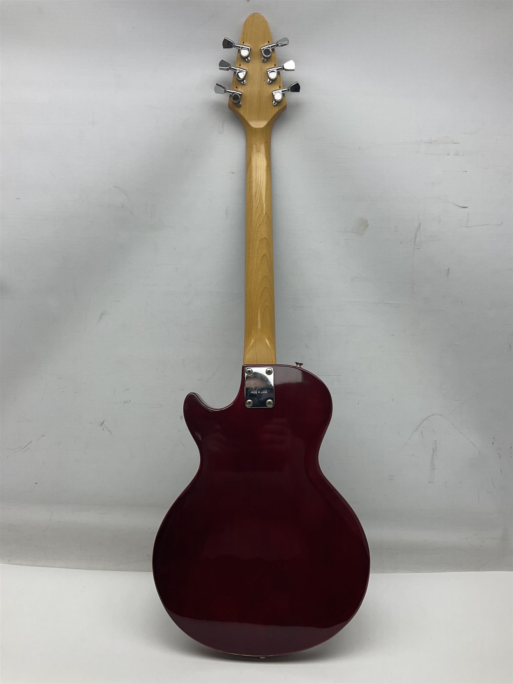 Gibson Marauder style six-string electric guitar with cherry coloured body, marked made in Japan L101cm; in locking hard carrying case