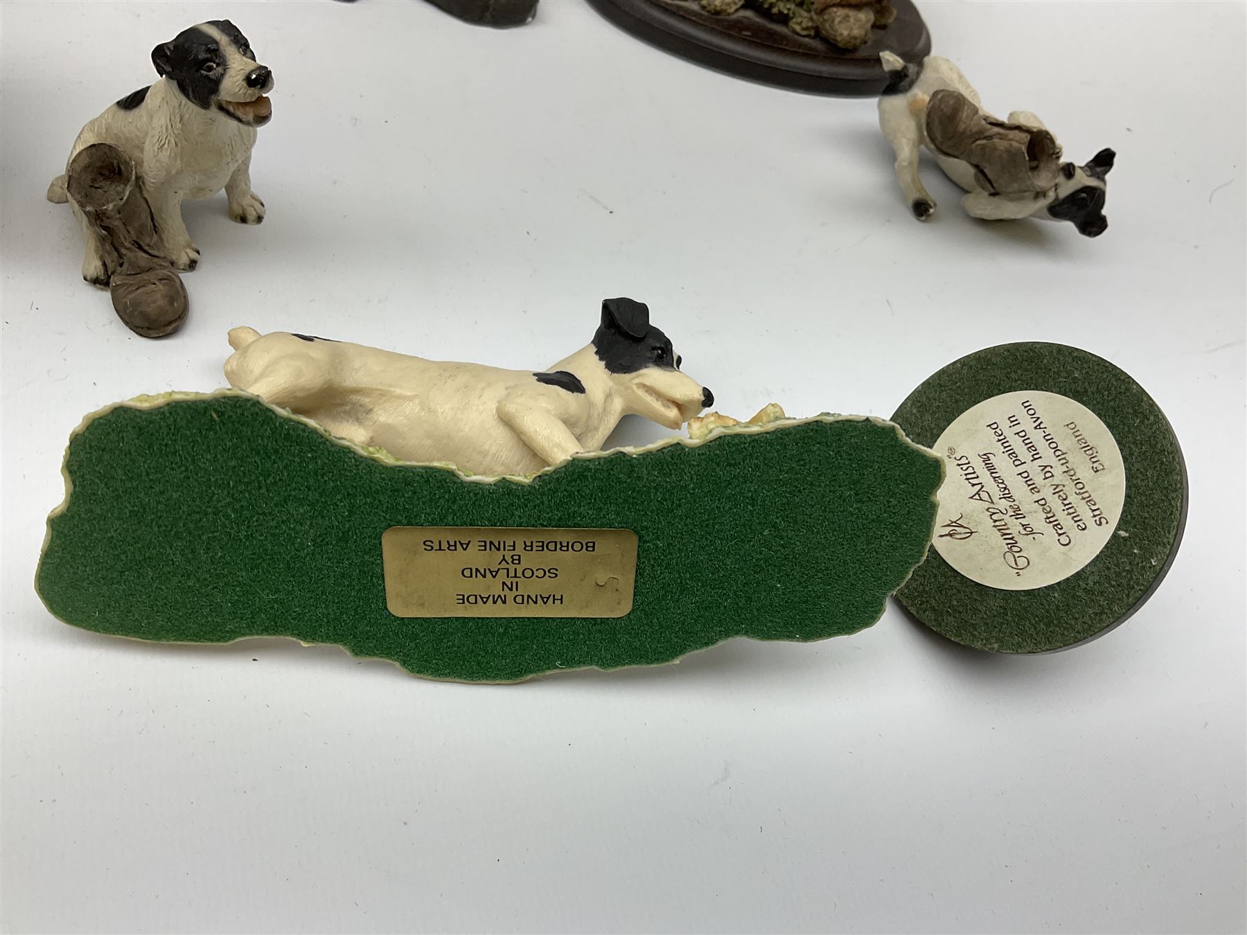 A Border Fine Arts figure, Scottish Black Faced Sheep with Collie, by Ray Ayres, on base, L30cm, together with three further Border Fine Arts figures, two examples modelled as Jack Russel Terriers, the third example modelled as a rabbit, plus a selection of other figures, including five by Country Artists, a bronze effect Heredities figure of a Jack Russel Terrier, etc.