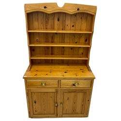 Solid pine dresser, fitted with two drawers and cupboards, with plate rack