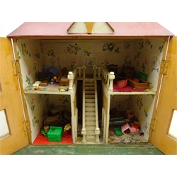  Early 20th century painted wooden dolls house Woodbine Cottage, two storey with a collection of vintage wooden and plastic furniture including Kleeware, H80cm x W84cm   