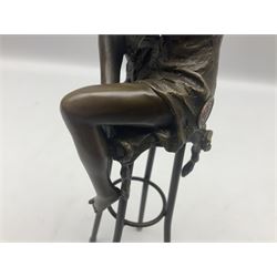 Art Deco style bronze modelled as a female figure seated upon a chair, after Pierre Collinet, H28cm