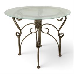 Wrought metal and glass table, with silvered foliate and scrolled design