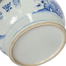 Late 18th/early 19th century Chinese export blue and white tureen and cover, the body with twin curved handles, the pieced and domed cover with multi flower head finial, painted with peonies, rockwork, and fences, overall H26.5cm D22cn 