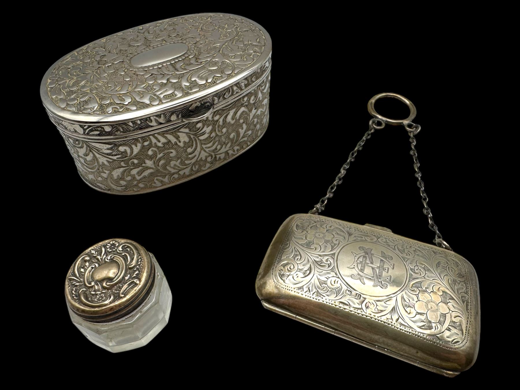 Silver coin purse, silver topped glass jar, both hallmarked together with a silver plated oval box