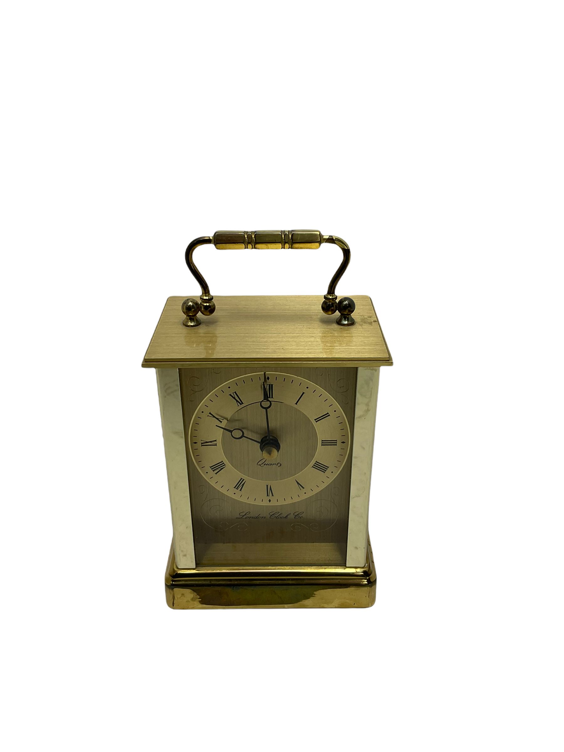 Battery driven marble mantel clock in the Art Deco style and a brass finished carriage clock. Both with quartz movements