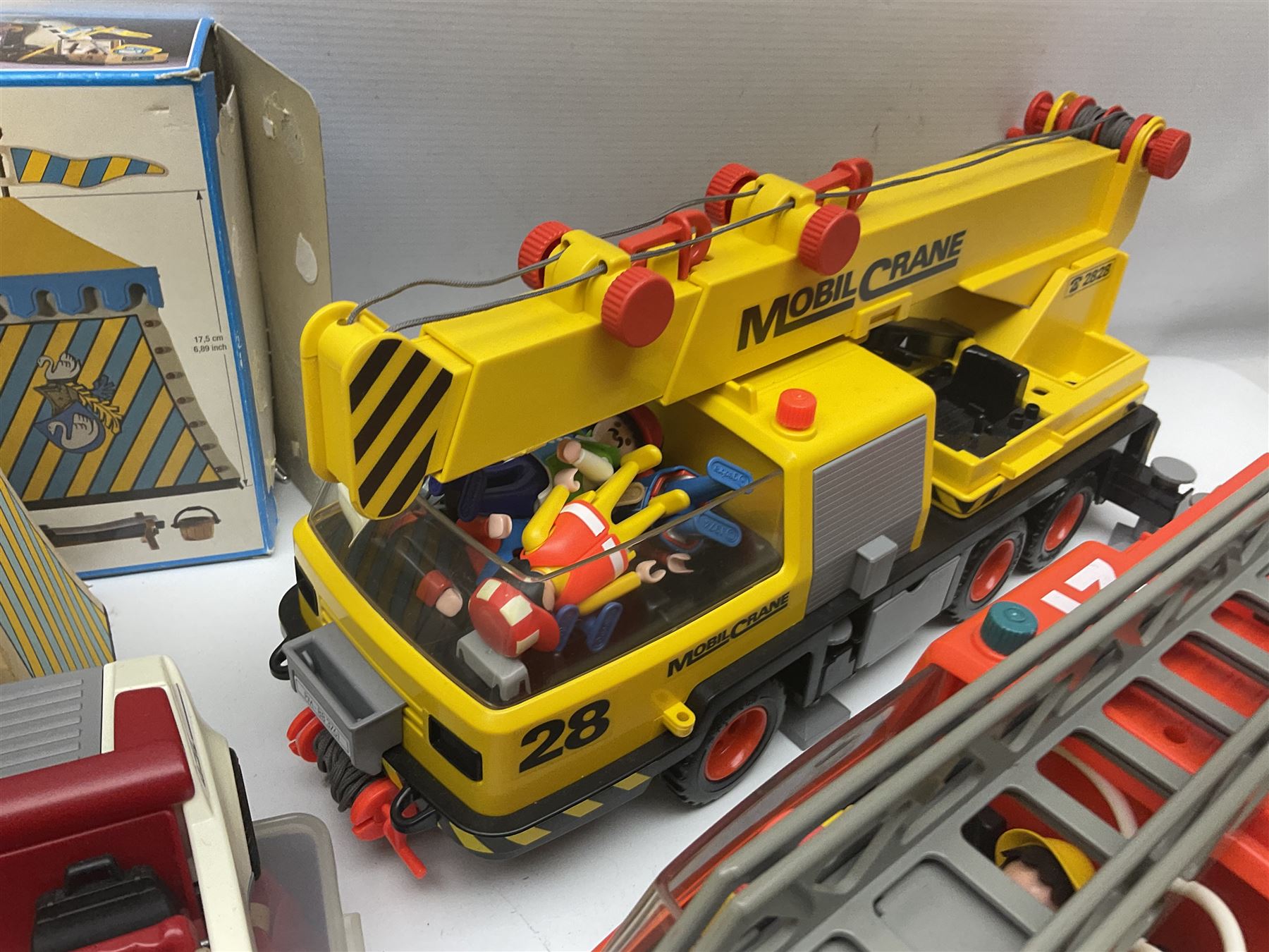 Collection of 1980s/90s Playmobil - vehicles including Fire-Engine No.21, Mobil Crane No.28, Quick Service Truck No.1 with trailer, Dumper Truck, GSL Sports car, GS Turbo car and three motorcycles; together with boxed Knights Tournament Set, Playmospace Space Station and Shuttle, wigwam and various accessories and figures etc