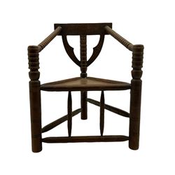Victorian oak corner turner chair, chip carved cresting rail over triangular seat, turned supports