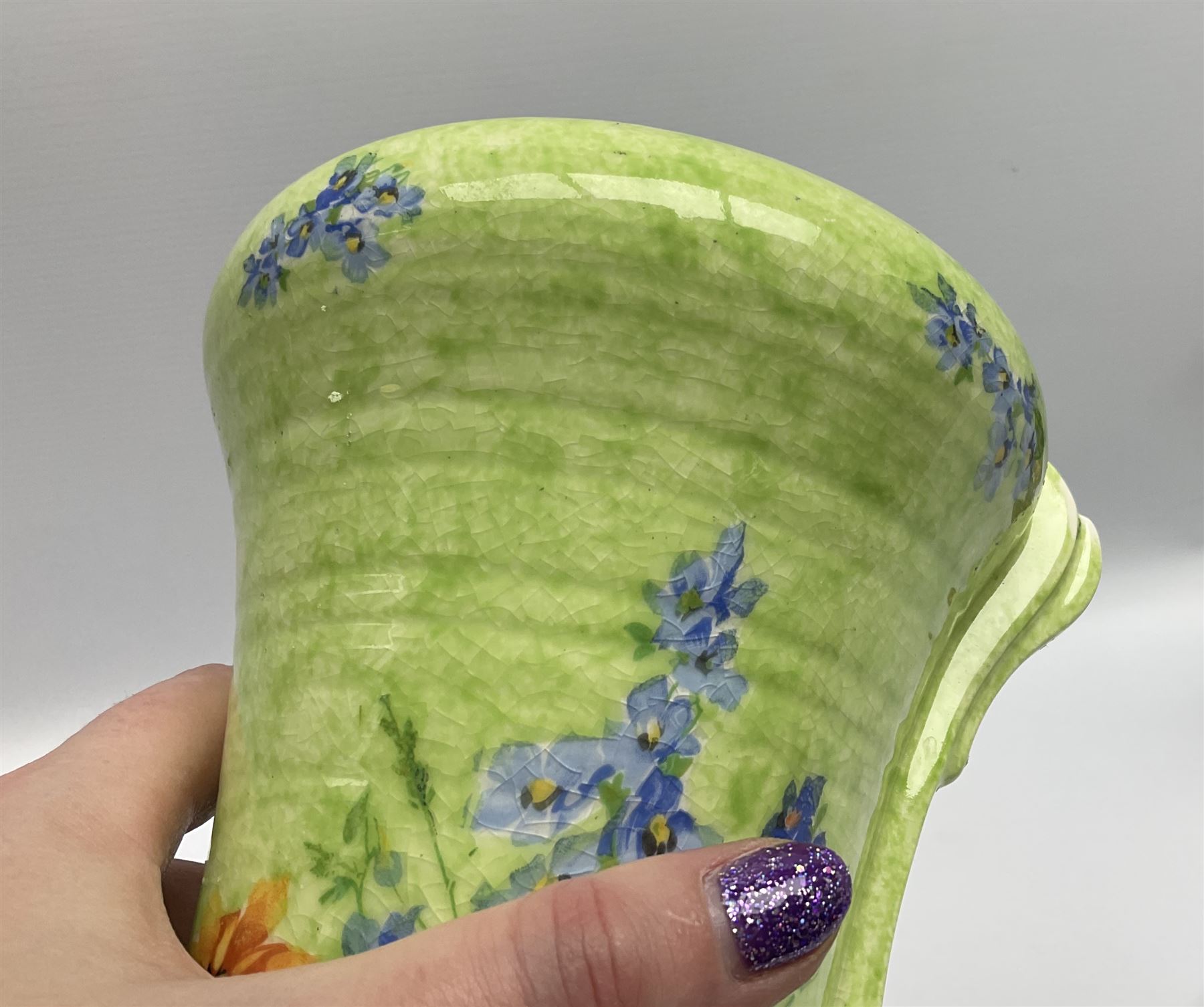 Victorian Wedgwood blue jasperware jardiniere H16.5cm; Victorian copper lustre jug; James Kent art deco style green glazed jug; and Beswick figure of a singing cat (4)