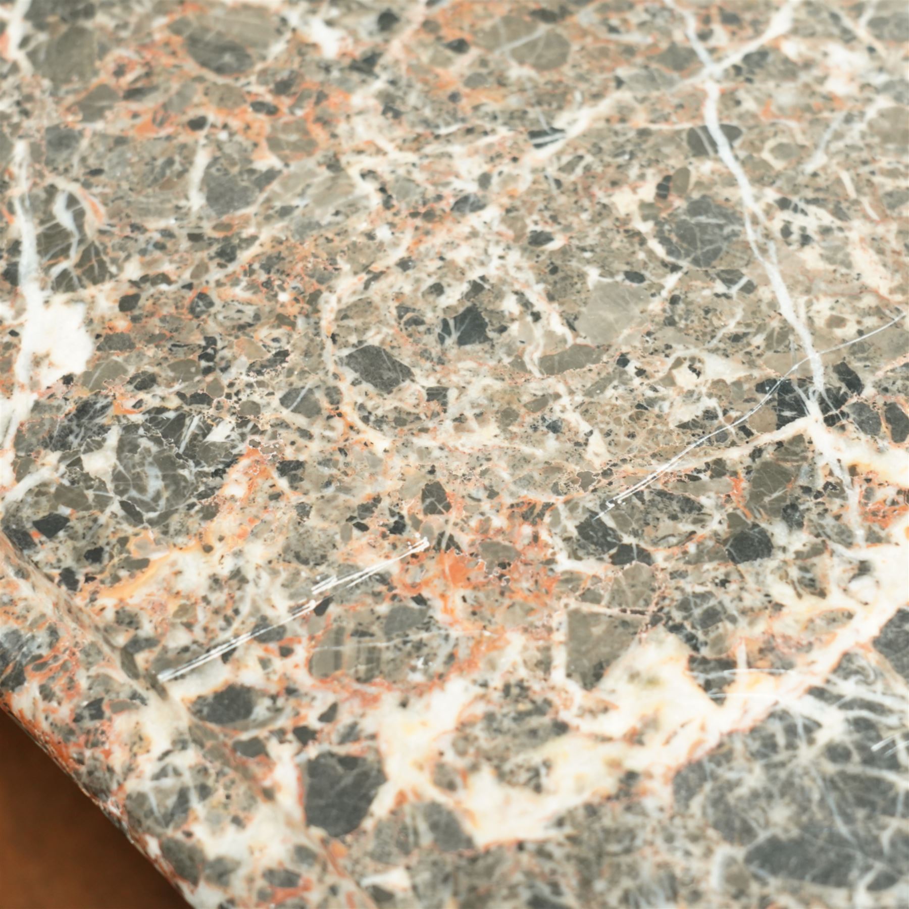 French Louis XV revival bombe commode, early 20th century, with variegated marble top above two drawers inlaid with floral marquetry, gilt metal rococo handles and mounts, kingwood and tulipwood veneers laid in chevron and quartered patterns, on cabriole supports with gilt sabots