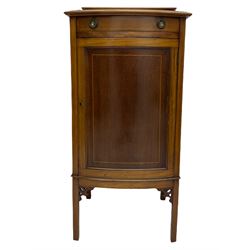 Edwardian mahogany bowfront music cabinet, panelled door enclosing four shelves, square tapering supports